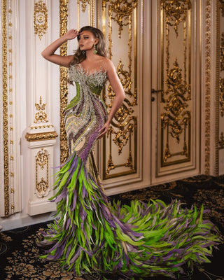 Strapless gown with intricate stone and feather embellishments