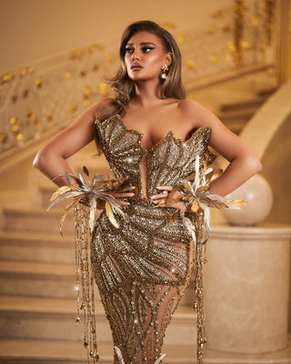 Glamorous sleeveless dress with gold and silver embellishments