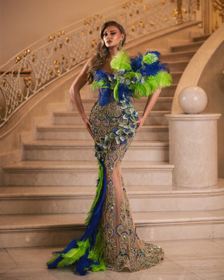 Sleeveless strapless gown in blue and green with 3D floral embellishments
