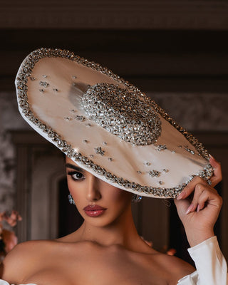 White bridal couture hat with crystal embellishments