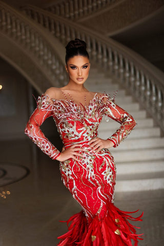 Couture red dress with feathers