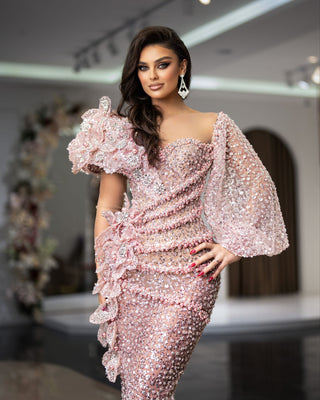 Light pink dress with wide sleeves and shimmering bead detailing