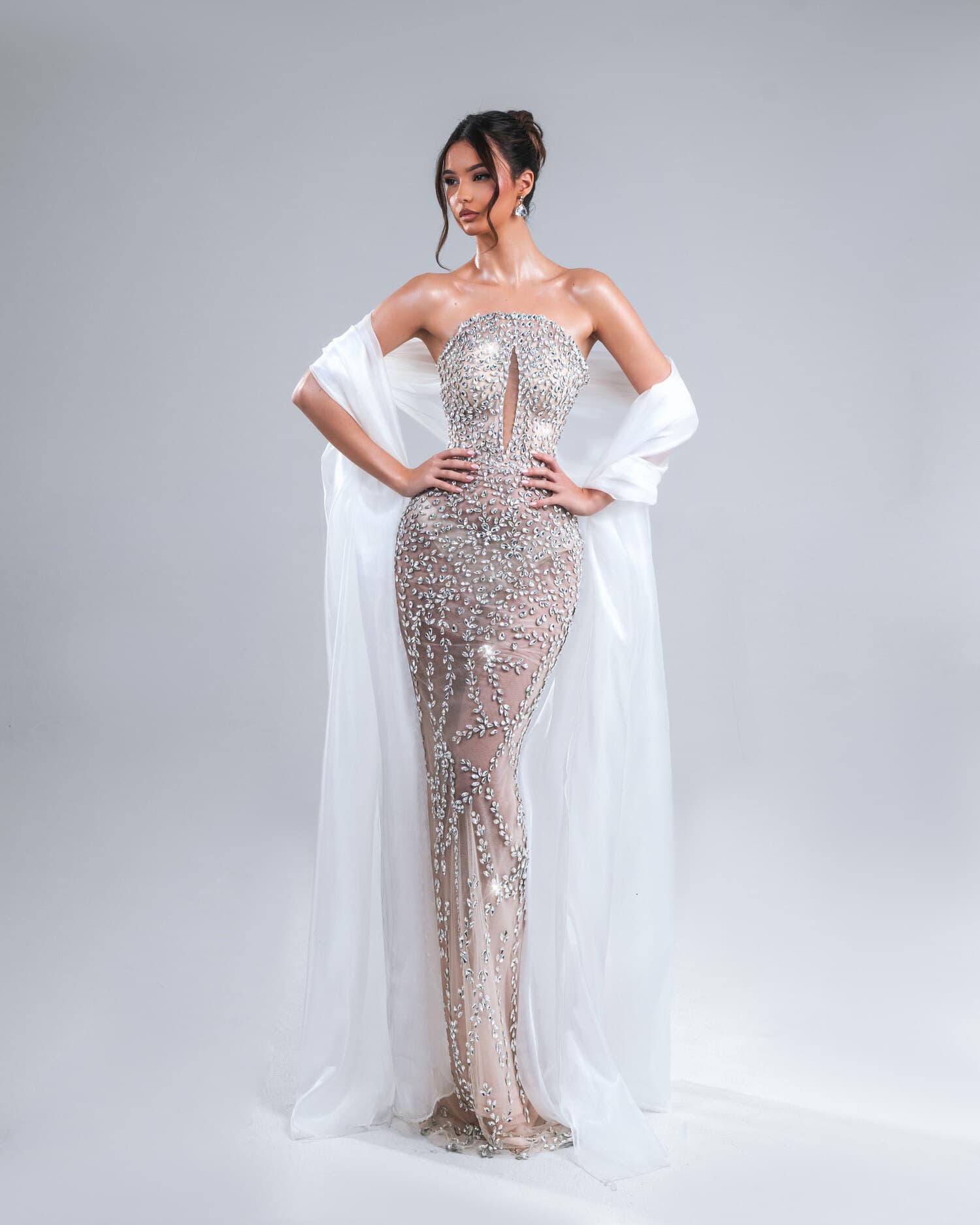 ARGENTÉA — silver crystal gown with centre keyhole and sheer organza cape, AURORA collection by BLINI