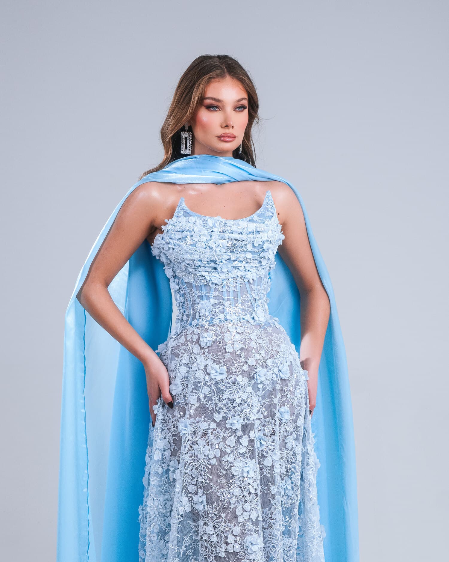 CIELÉA — powder-blue crystal floral gown with sky-blue organza cape, AURORA collection by BLINI
