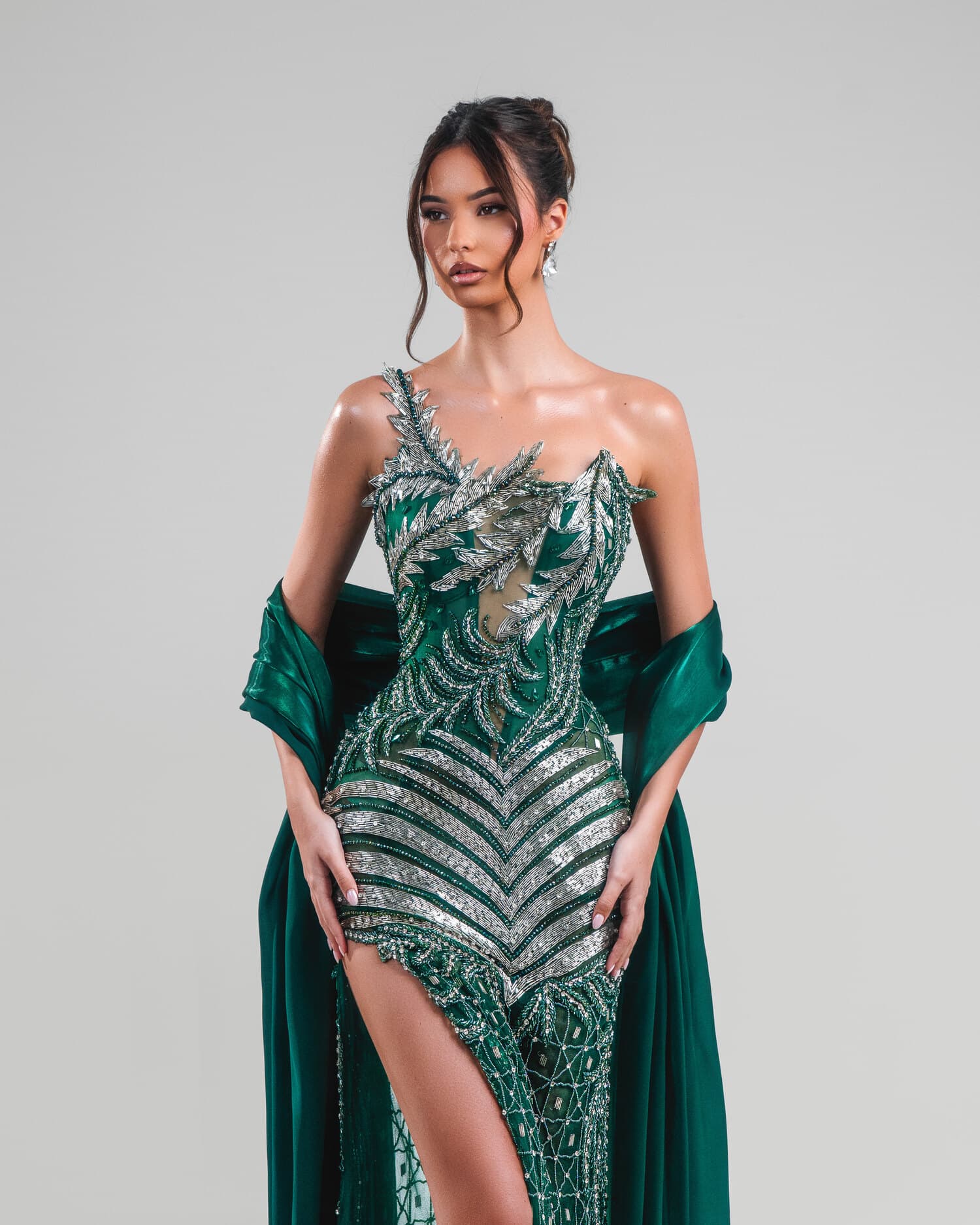 ÉMERAUDE — emerald geometric-sequin one-shoulder gown with thigh slit, AURORA collection by BLINI