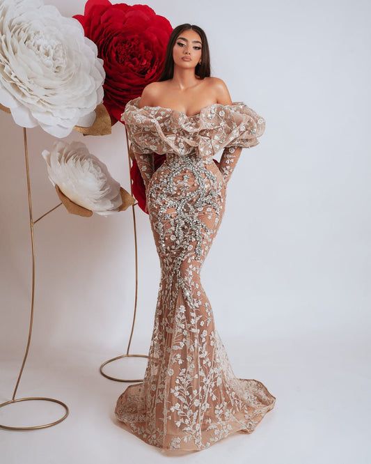 Elegant beige off shoulder dress with long sleeves and silver crystal embellishments