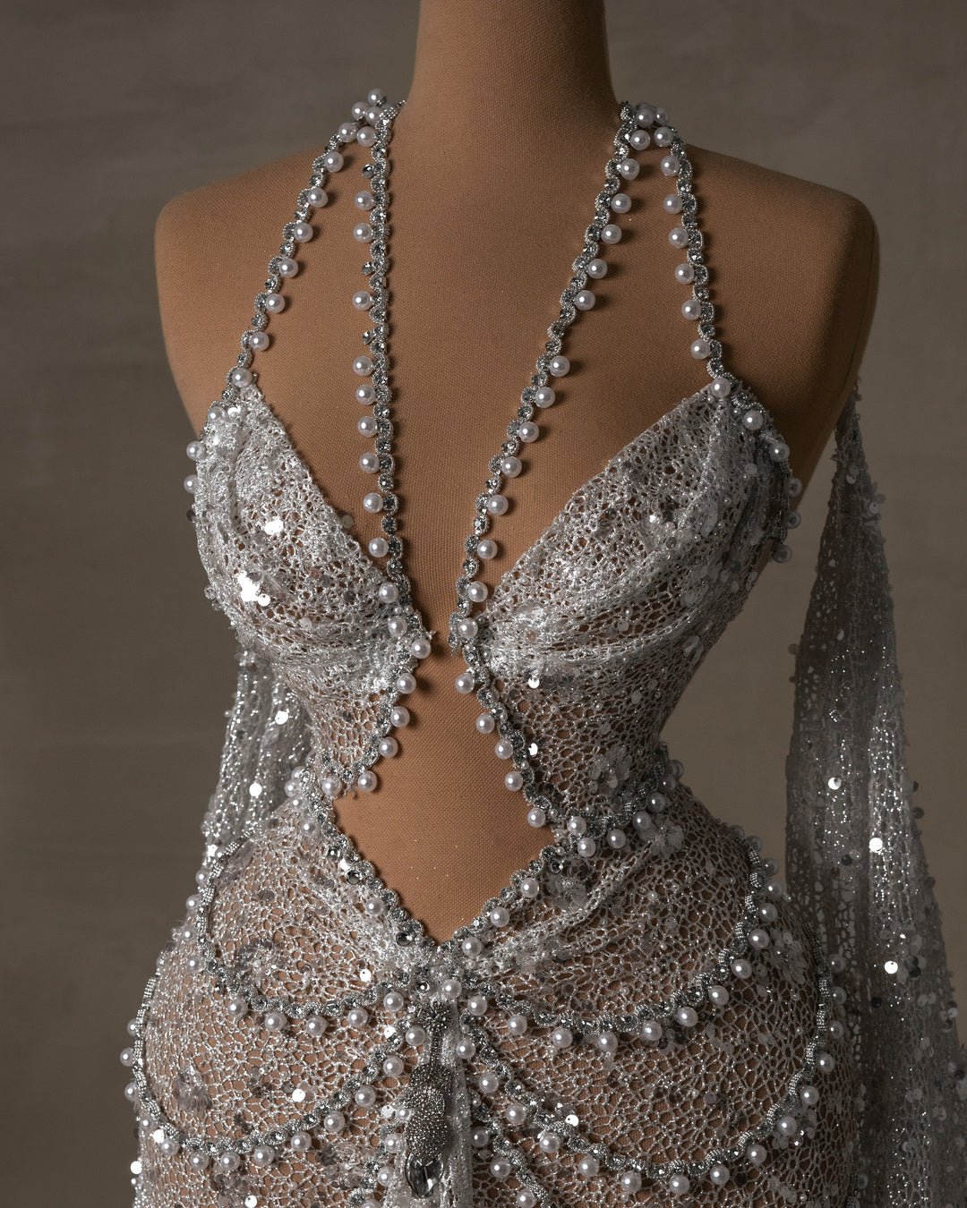 Detailed view of the hot bridal dress halter neckline and beadwork