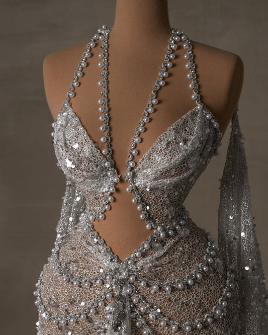 Detailed view of the hot bridal dress halter neckline and beadwork