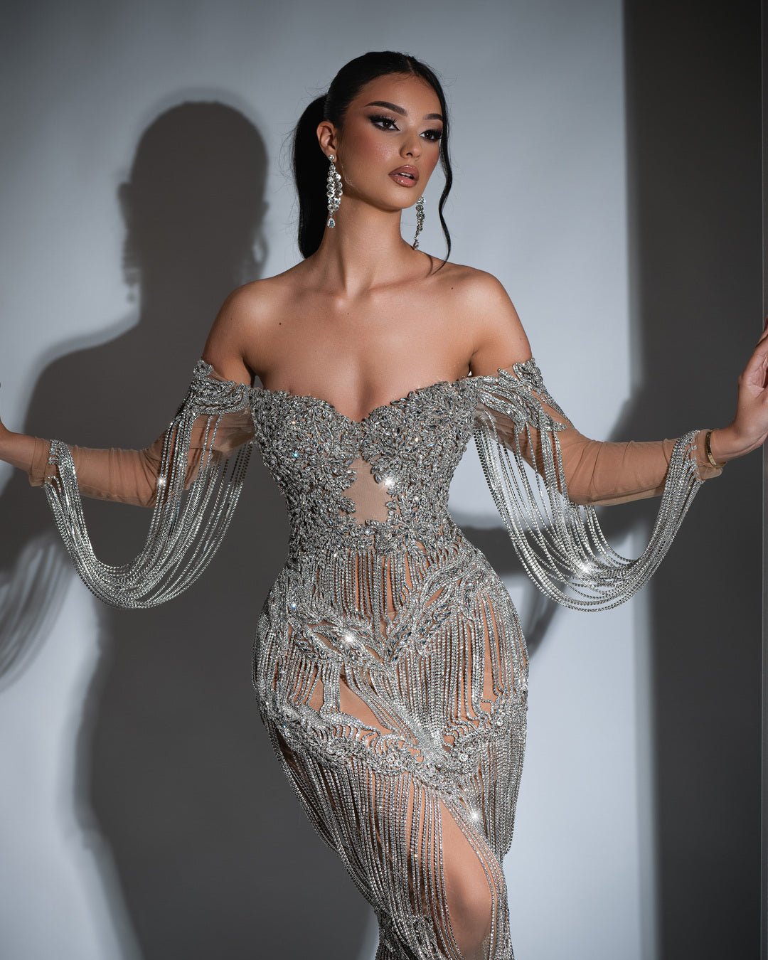 Maxi off shoulder dress embellished with silver tassels and crystals