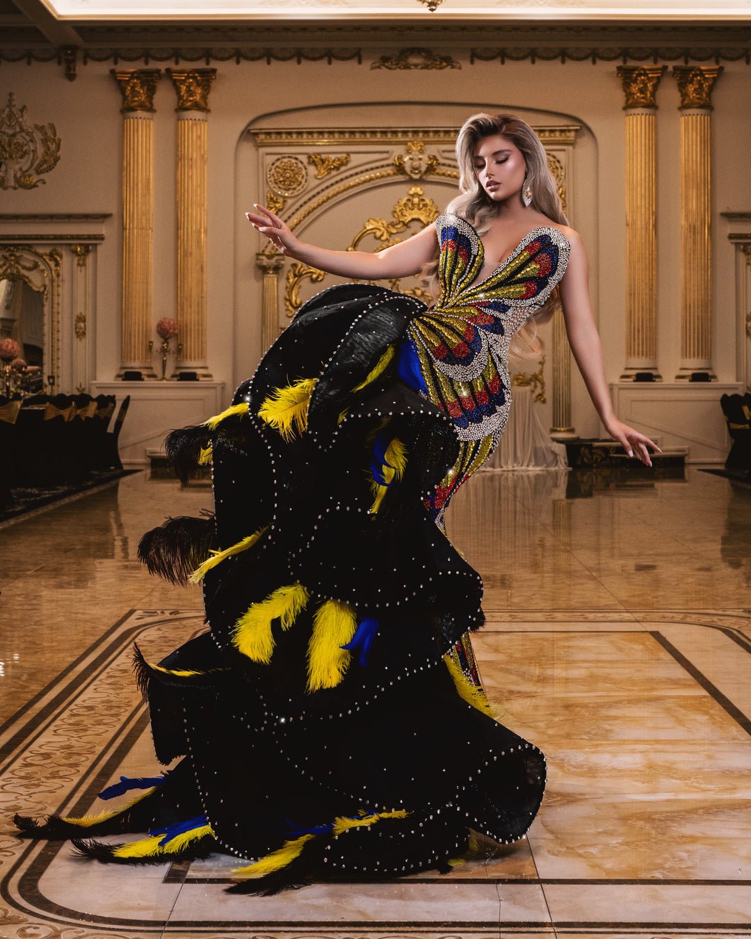 Luxury black lace dress embellished with crystals and feathers