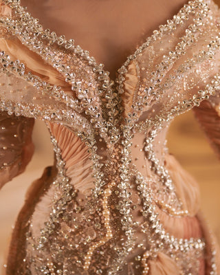 Close-up of Sparkling Beads and Stones on Peach Lace Dress