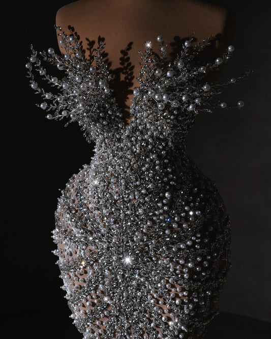 Close-up Detail of Sleeveless Bridal Dress - Intricate Crystal and Pearl Embellishments