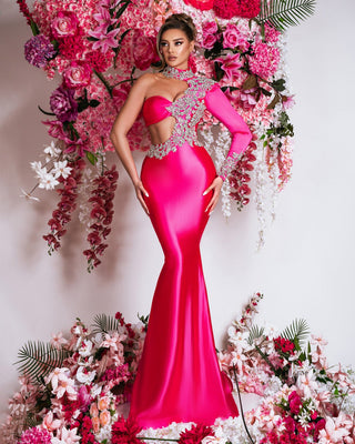 Elegant long satin gown in pink with one-shoulder design and hot cut-out detail