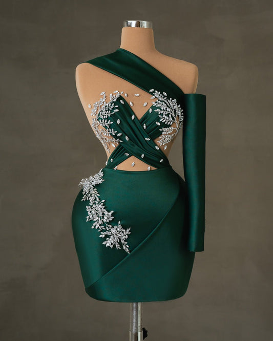 Green short dress with one-shoulder design in emerald satin