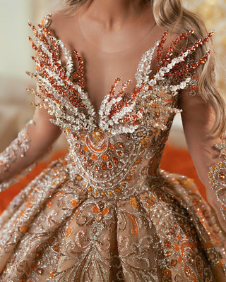 Close-Up of Exquisite Crystal Detailing on Orange Gown