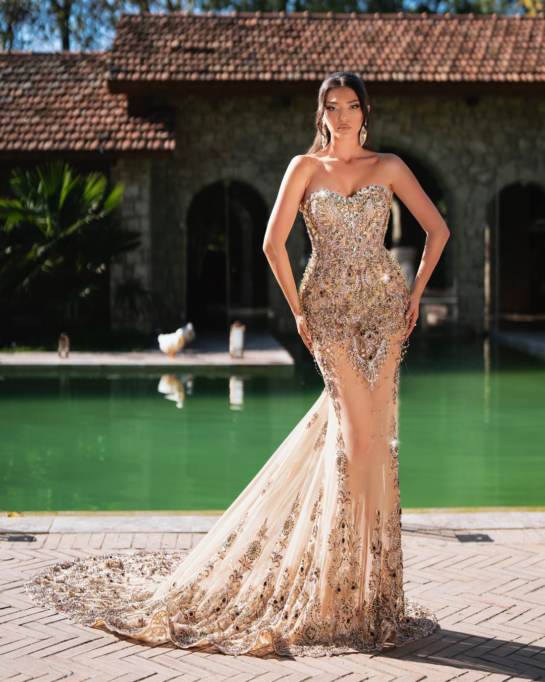 Maja Long Dress worn elegantly, showcasing its adaptability from a formal gown to a chic daytime look.