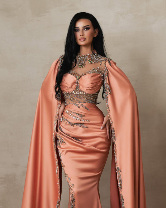Nyxara Peach Dress with Flowing Arm Capes