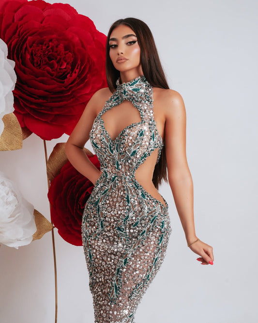 Luxury silver dress with blue details, featuring a deep chest cut-out and waist cut-outs.