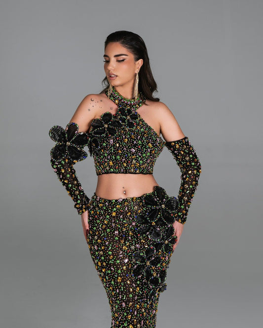 Paola two-piece dress featuring a crop top and mermaid skirt with intricate floral design.
