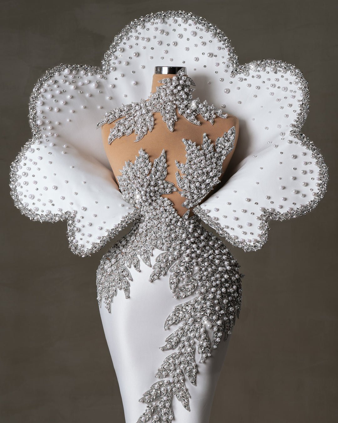 Luxury satin bridal dress in white with crystals and pearls