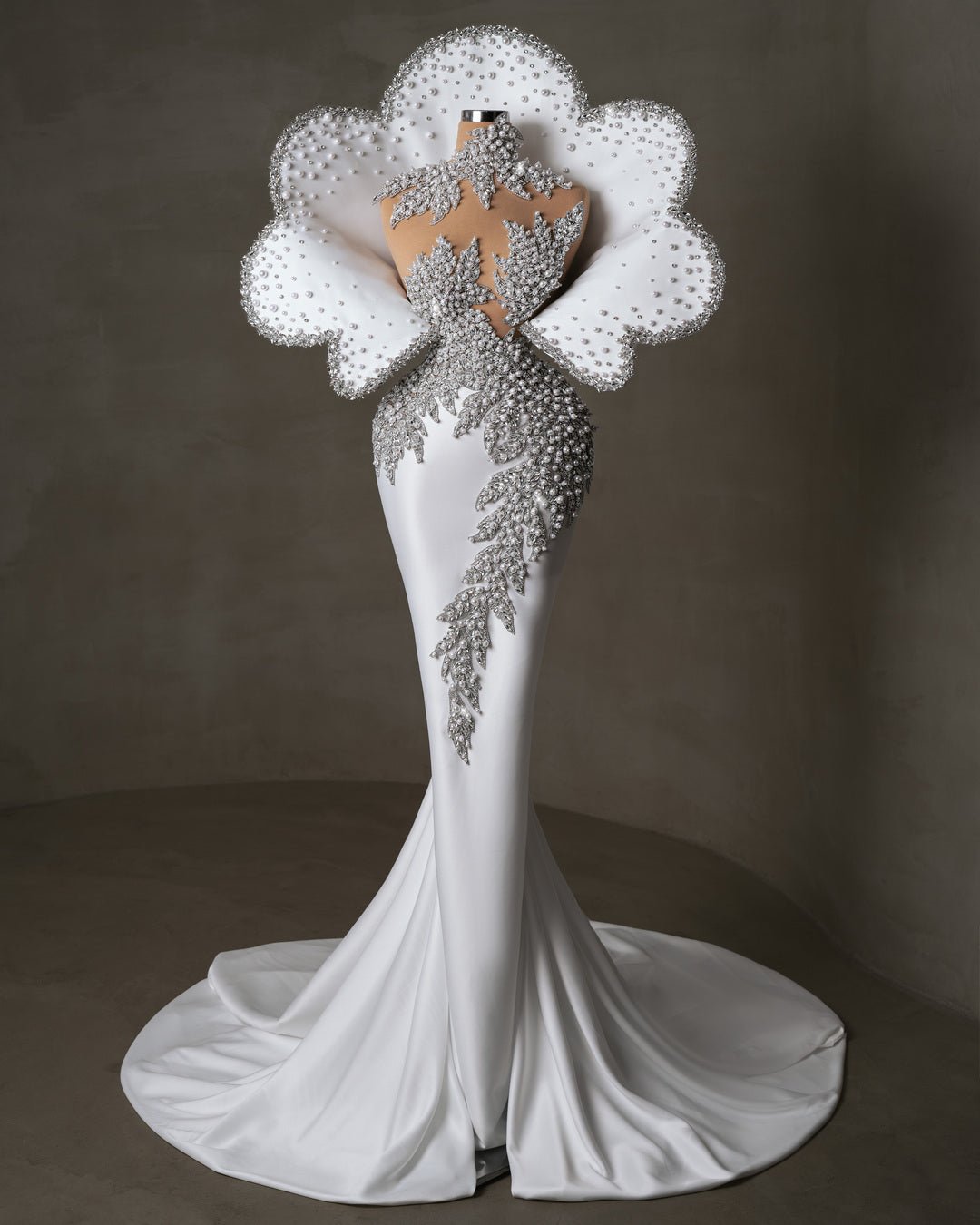 Elegant wedding gown with 3D design and embellishments