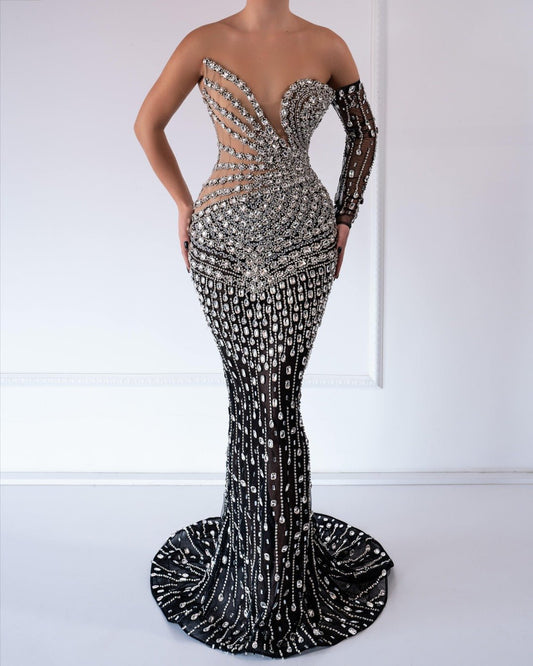 Black and nude gown with crystal embellishments.