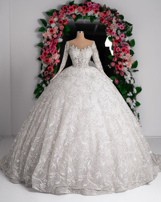 Elegant Bridal Dress adorned with Flowers and Stones