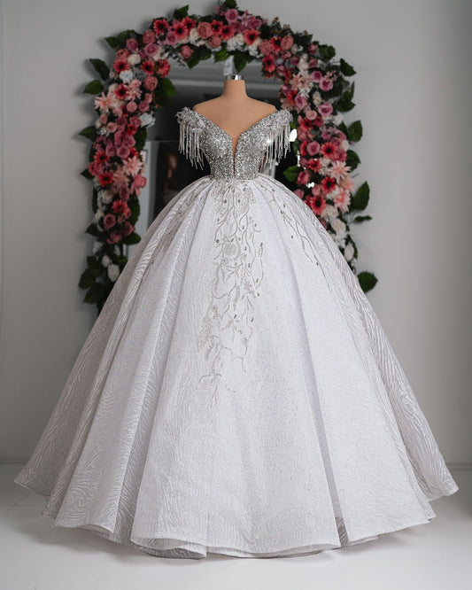 Roselyn Off Shoulder Bridal Dress with crystal embellishments, featuring a flowing skirt and elegant neckline.
