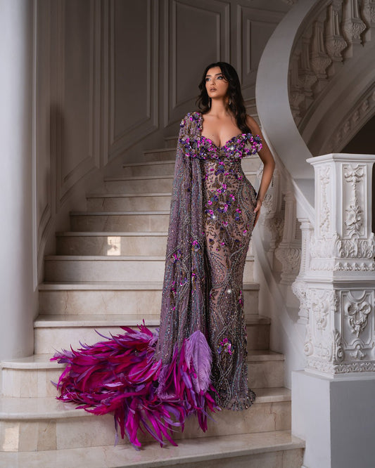 Elegant one-shoulder dress featuring vibrant floral designs.