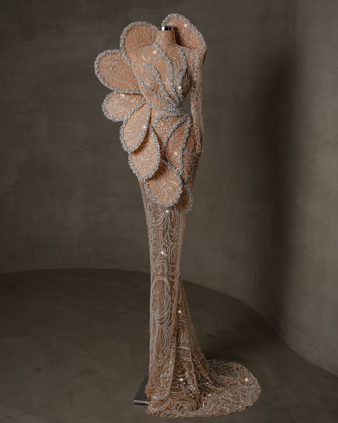 Luxurious one shoulder dress adorned with crystals and intricate detailing