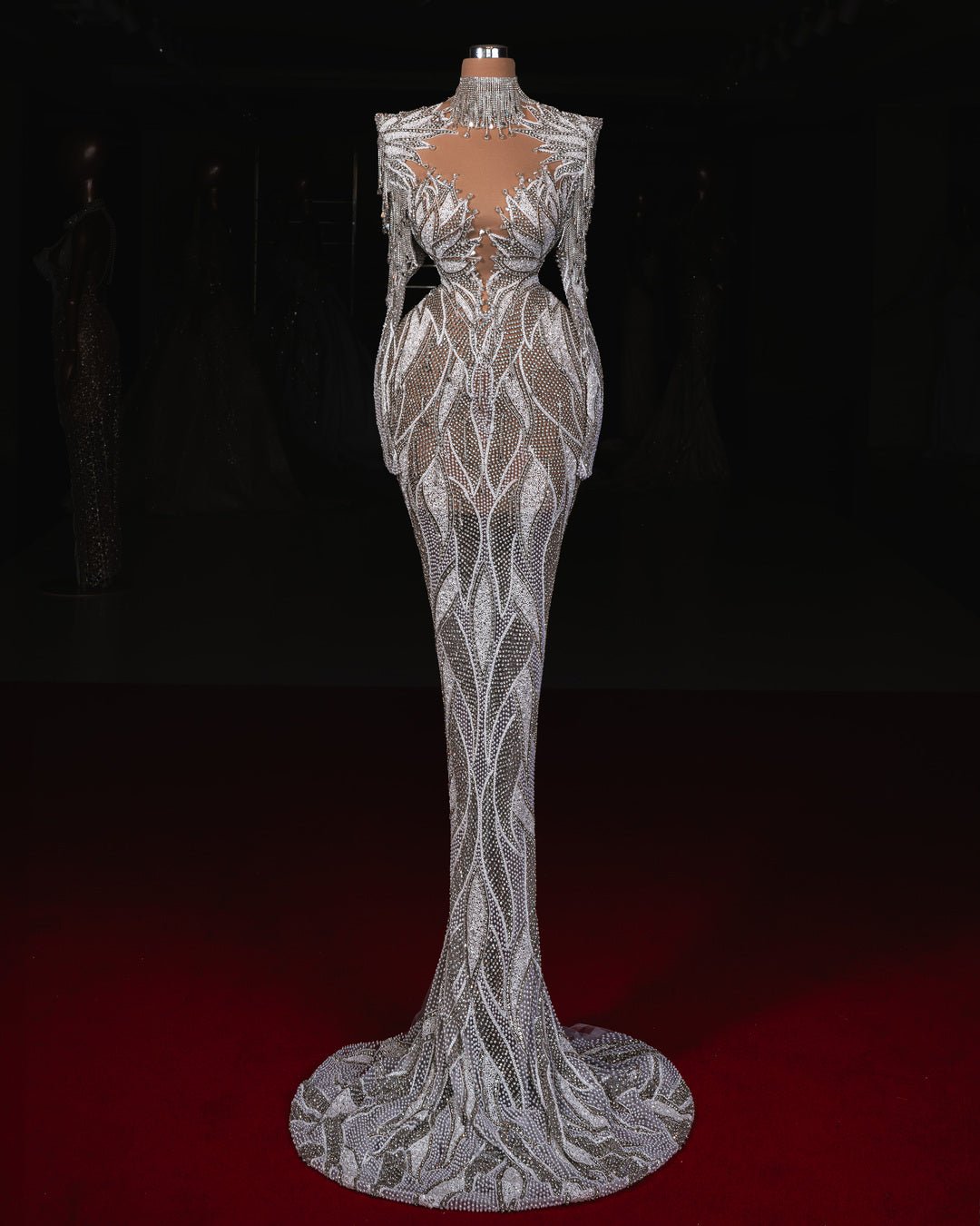 Yasra Bridal Dress featuring delicate crystal embellishments and a flowing silhouette for a regal style.