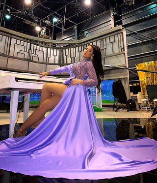 Alesia Bami stunning in Blini's regal violet dress