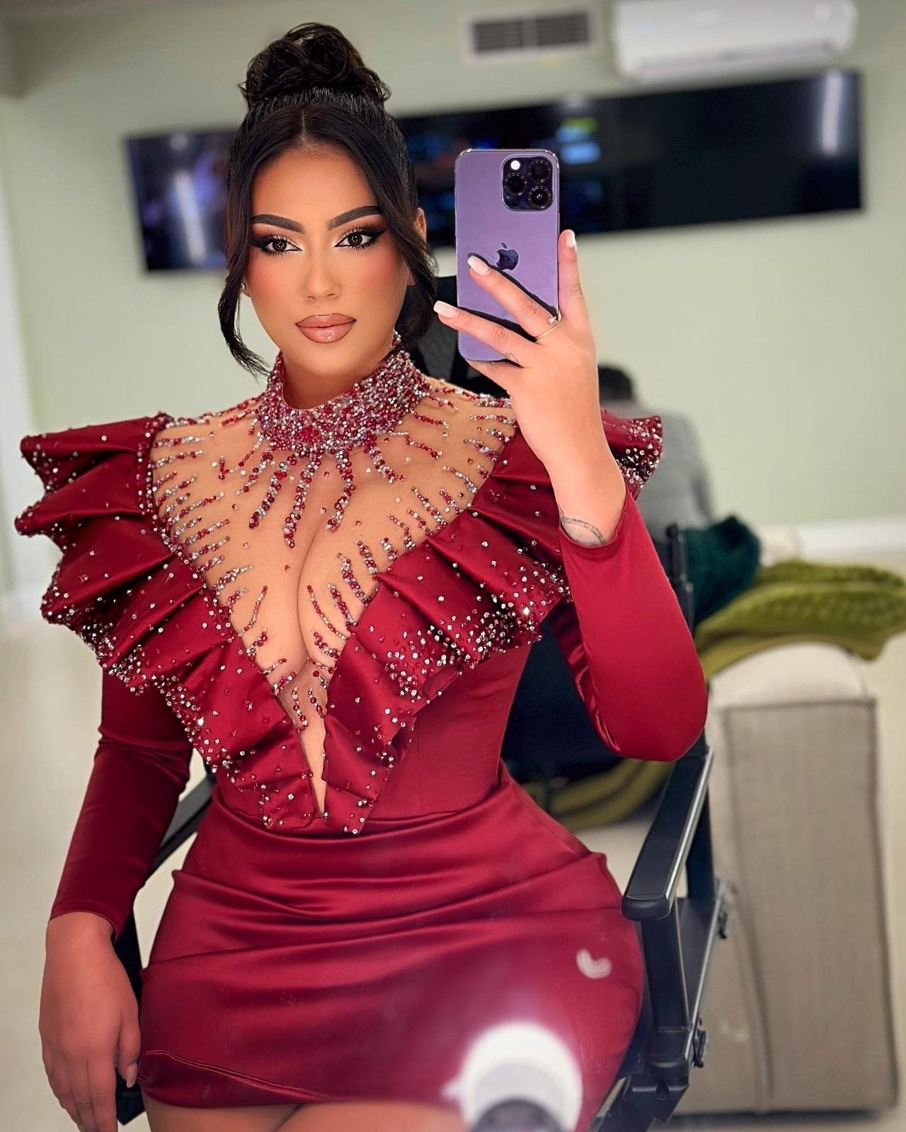 Elegant style: Alesia Bami showcasing Blini's beautiful red dress