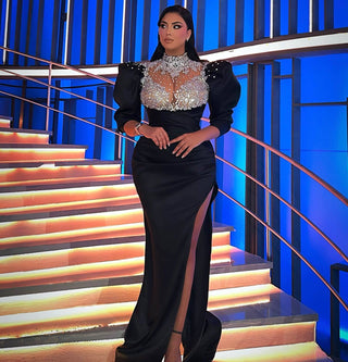 Alesia Bami flaunting elegant black dress by Blini