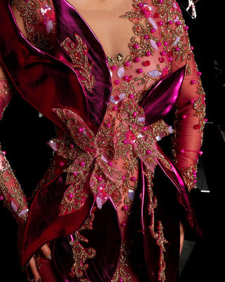 Close-up of pink dress with intricate beadwork