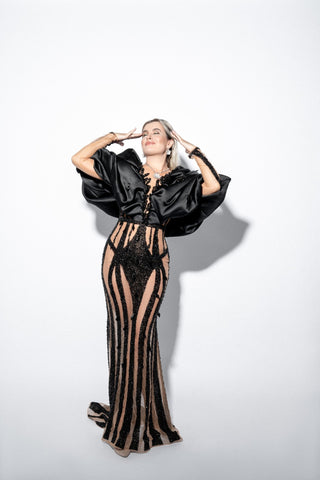 Anna Stukkert showcasing elegance in Blini's Black Dress