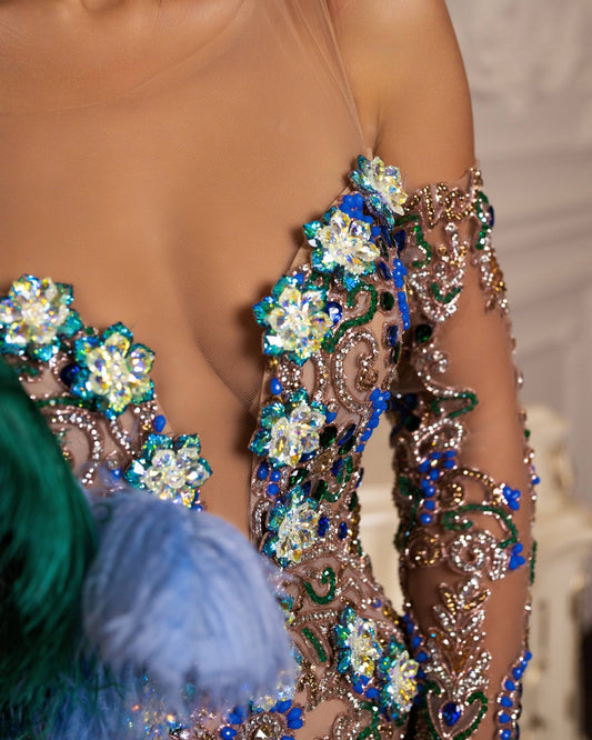 Intricate crystal detailing on a luxe lace gown.