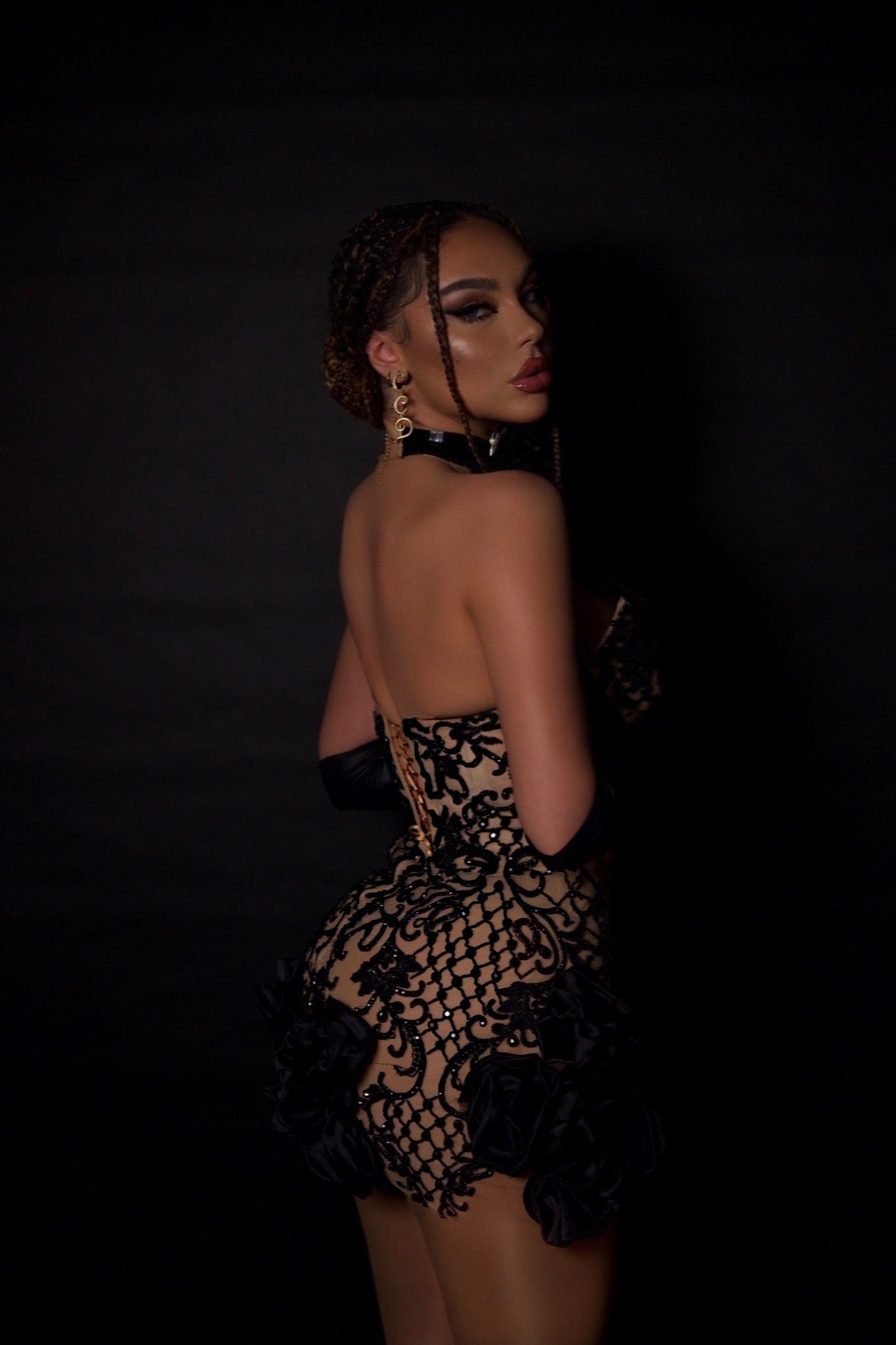 Fashion-forward Belinda Dragoti donning a chic black dress from Blini.