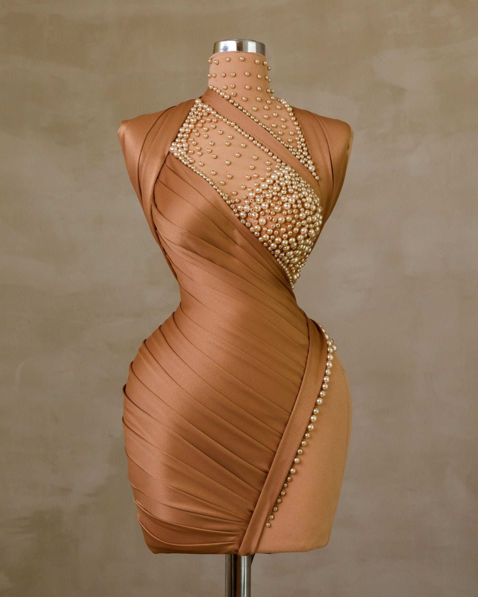 Pearl-Embellished High Neck Dress: A sophisticated dress with a high neck adorned elegantly with pearls, perfect for special occasions.