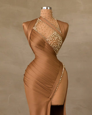 Pearl-Embellished Deep Slit Dress: A glamorous dress featuring intricate pearl embellishments and a striking deep slit.