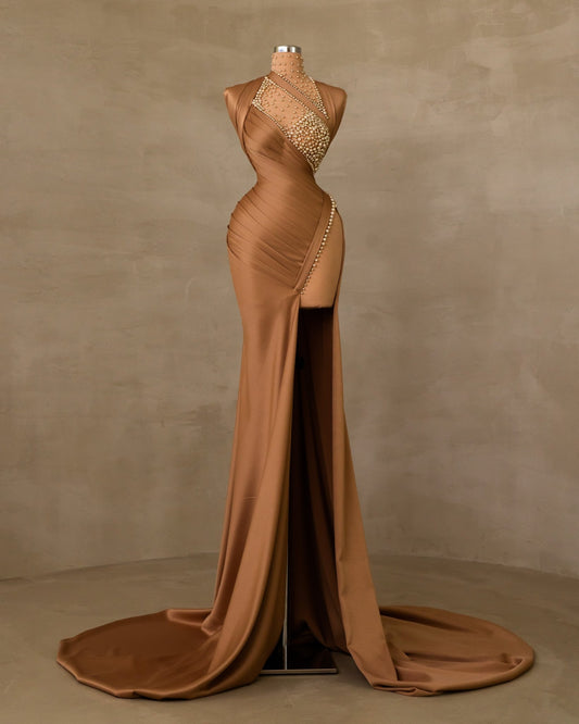 Elegant Pearl-Adorned Slit Dress: Discover luxury in this dress adorned with pearls, showcasing a daring deep slit design.