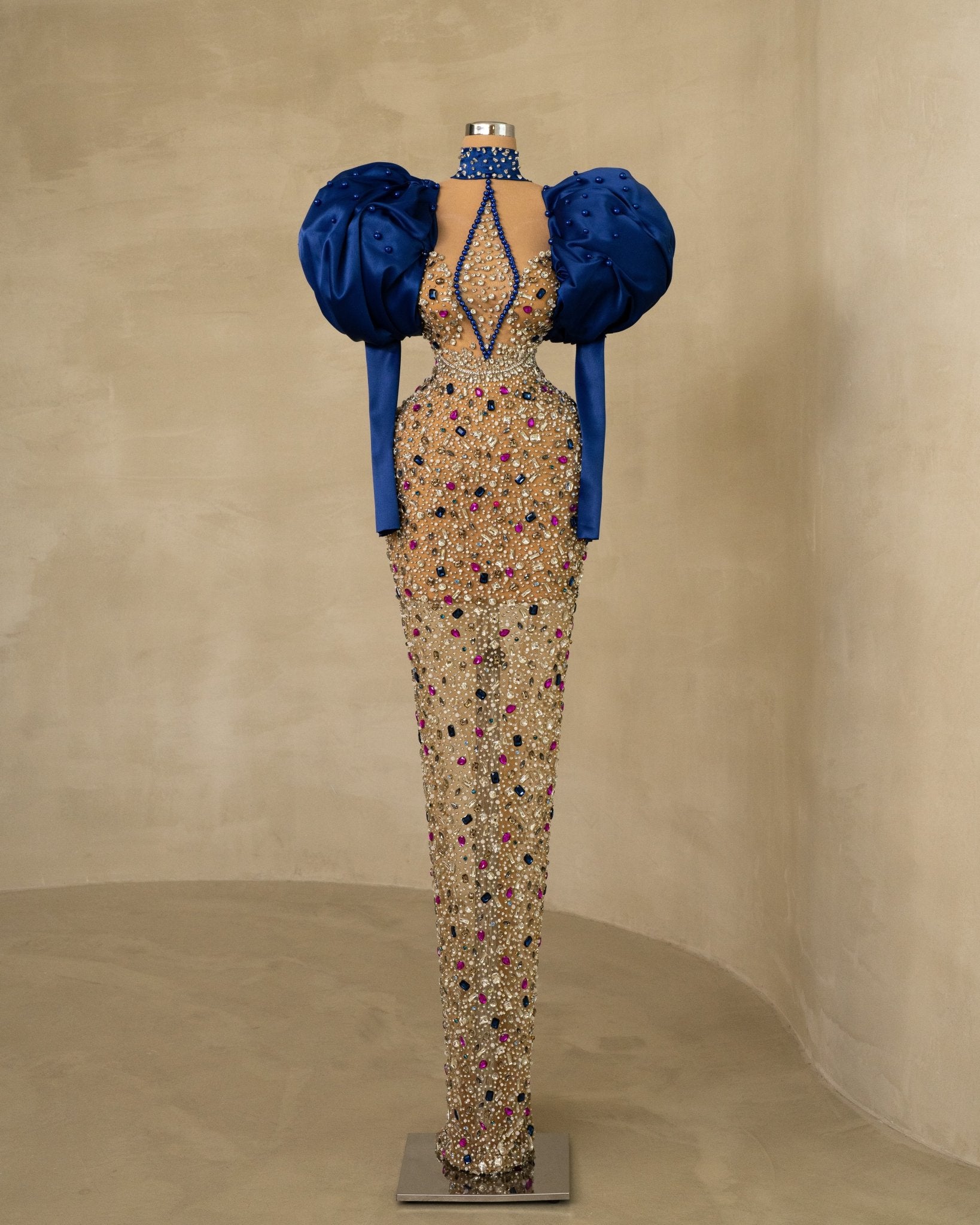 Glamorous Stone-Embellished Puff Sleeve Dress: Discover elegance in this high neck dress with puff sleeves, beautifully adorned with intricate stones.