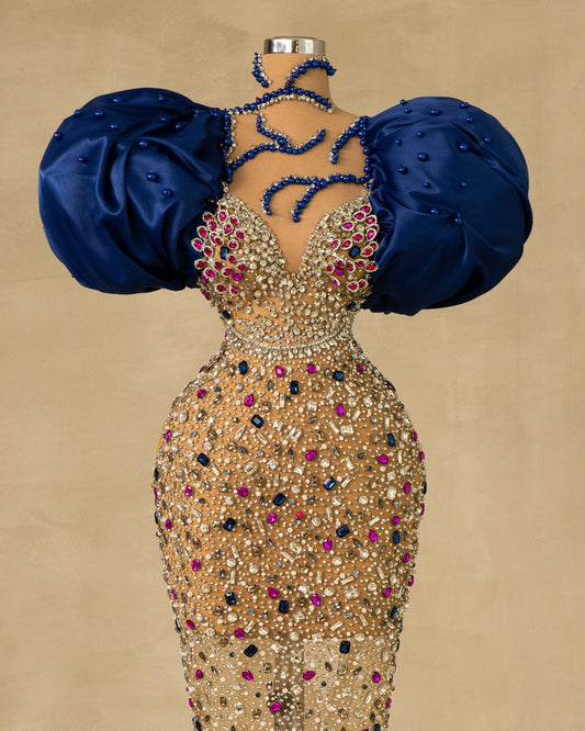 Stones-Adorned Puff Sleeve Dress: Explore luxury with this dress featuring charming puff sleeves and exquisite stone embellishments.