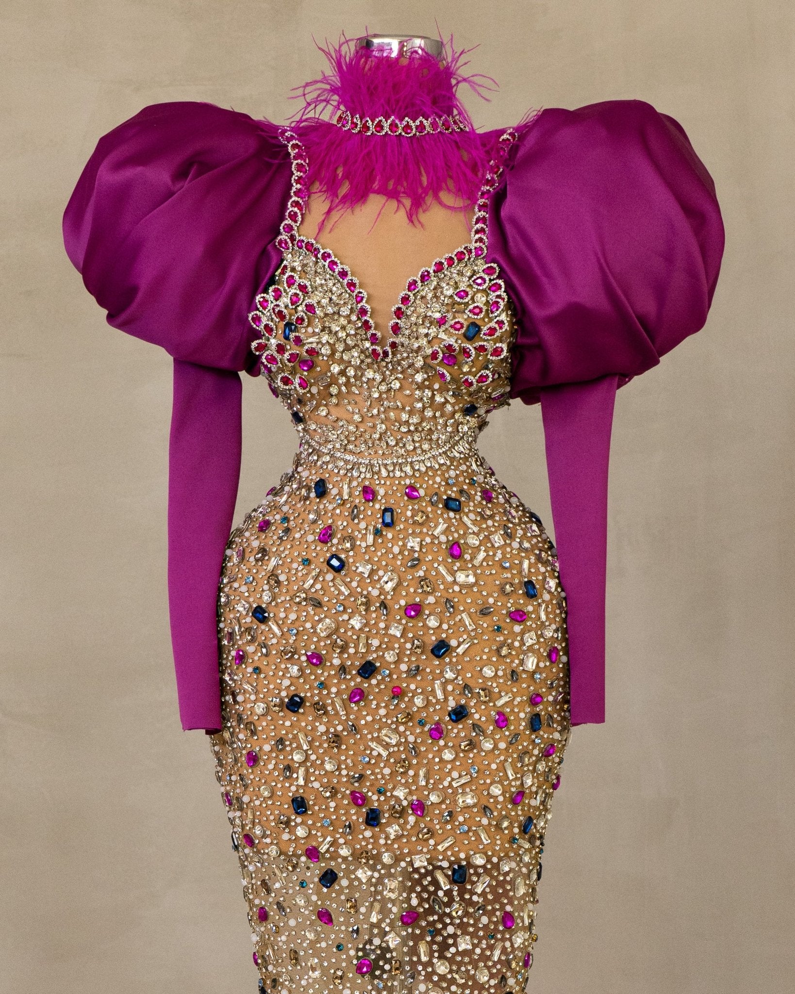 Elegant High Neck Puff Sleeve Dress: Discover sophistication with this dress featuring a high neck and lavish puff sleeves, adorned with exquisite stones.