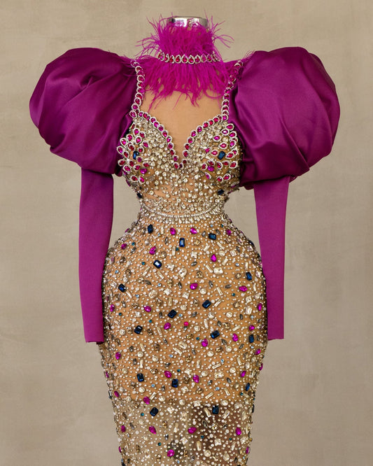 Elegant High Neck Puff Sleeve Dress: Discover sophistication with this dress featuring a high neck and lavish puff sleeves, adorned with exquisite stones.