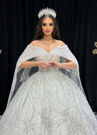 Catherine Sparkling Design and an Extravagant Cape Bridal Dress - Blini Fashion House