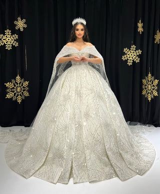 Catherine Sparkling Design and an Extravagant Cape Bridal Dress - Blini Fashion House