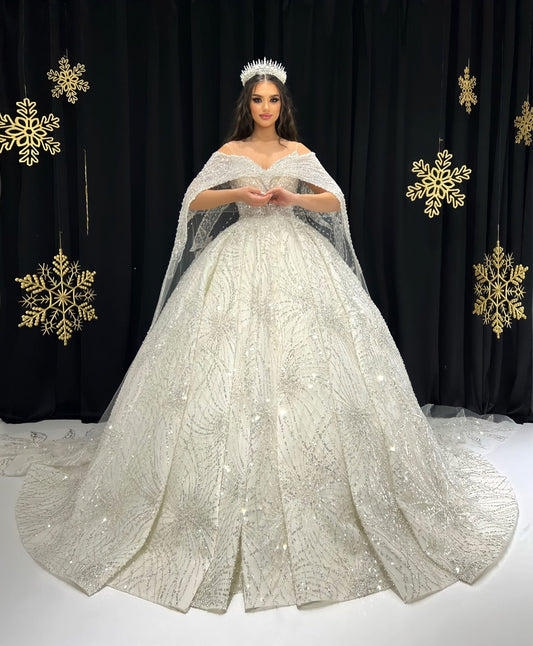 Catherine Sparkling Design and an Extravagant Cape Bridal Dress - Blini Fashion House
