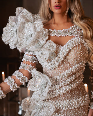 Exquisite Bridal Dress Details: Pearls, Sparkles, and Floral Accents