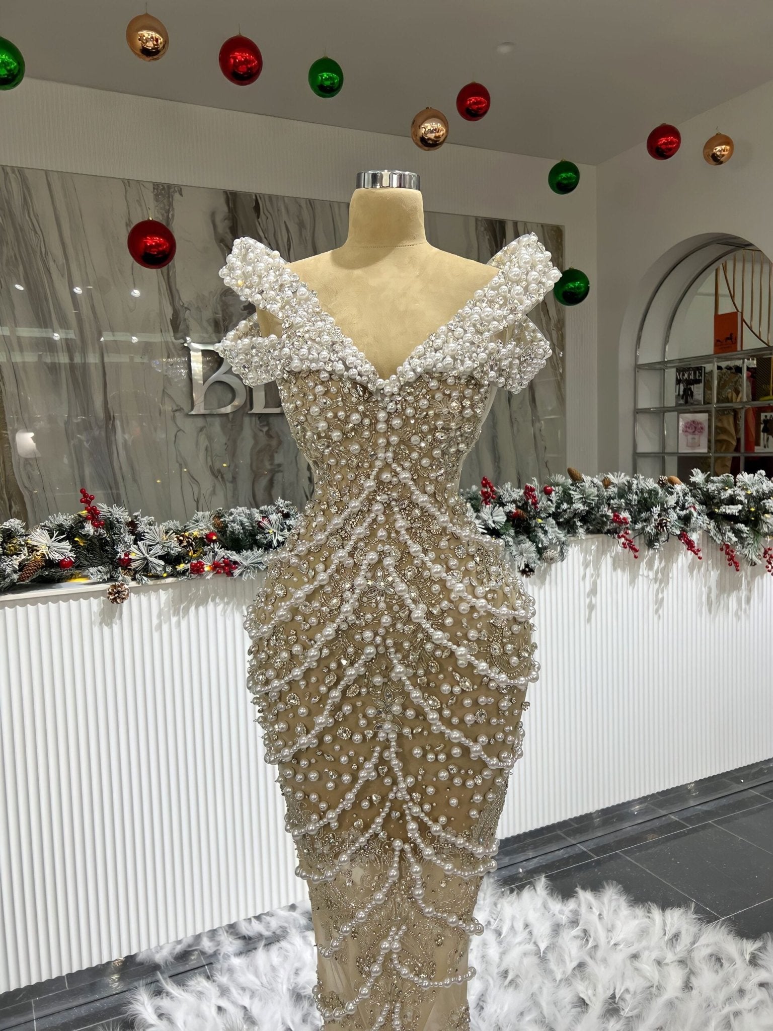 Eleanor Pearl Embellishments and a Feathered Tail Detail Bridal Dress - Blini Fashion House